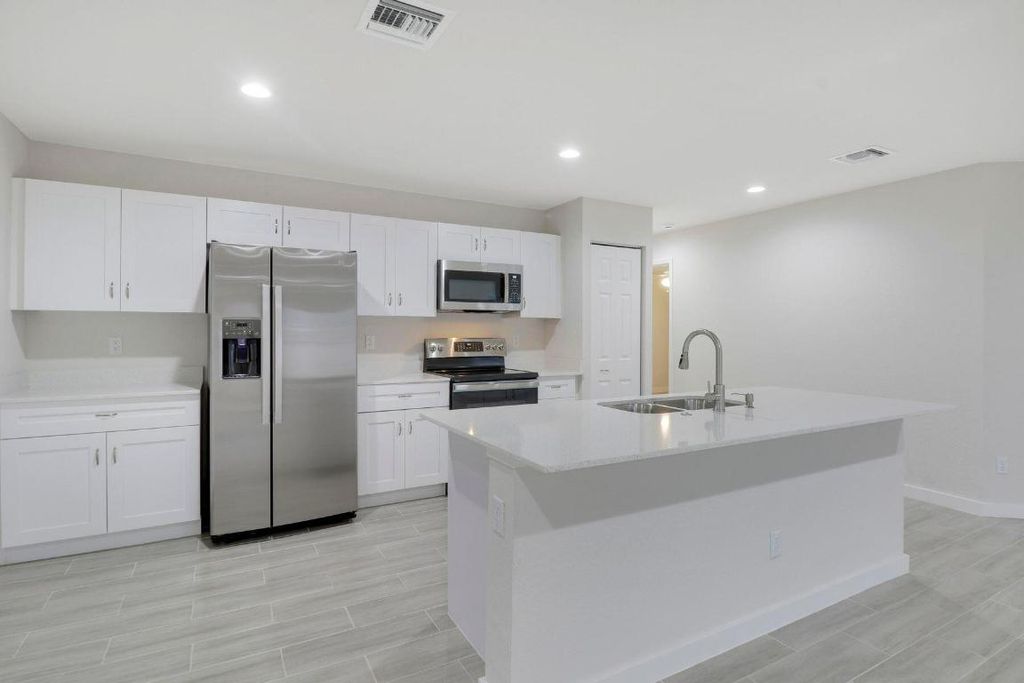 Photo of 2118 SW Alloway Avenue, Port Saint Lucie, FL 34953 (MLS # R10949729)