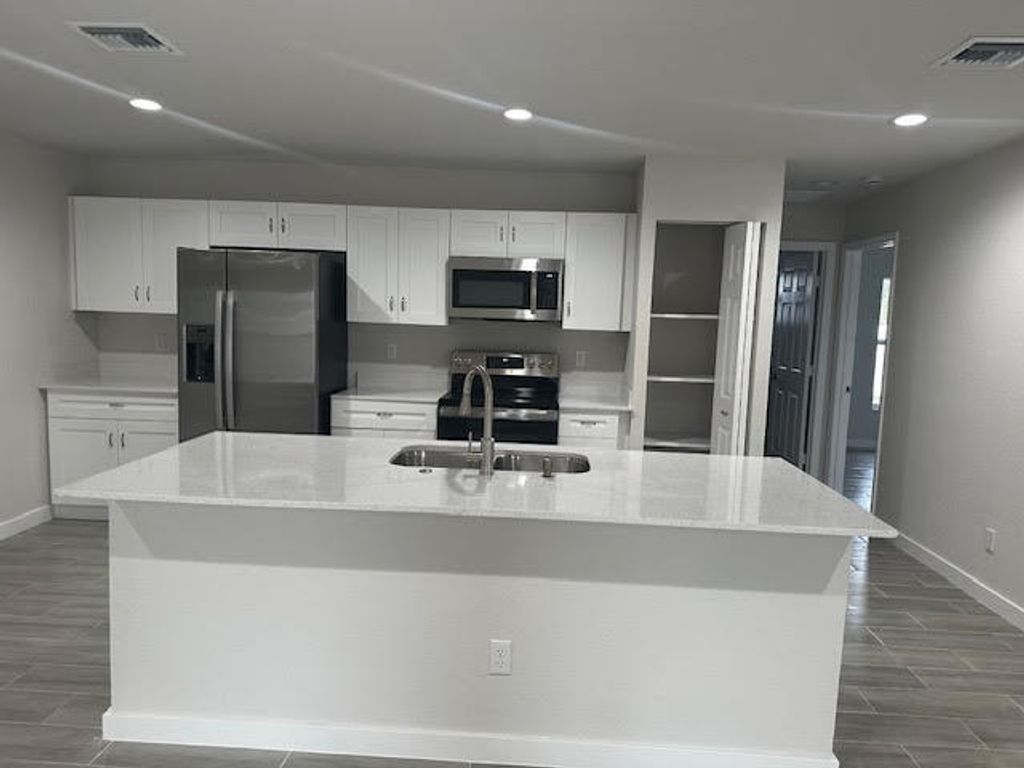 Photo of 2118 SW Alloway Avenue, Port Saint Lucie, FL 34953 (MLS # R10949729)