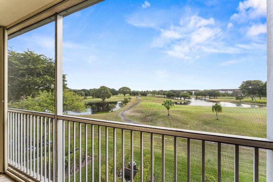 Priced to sell! Welcome to Century Village, a desirable 55+ resort-style community offering an active lifestyle and exceptional amenities. This 2-bedroom, 1.5-bath residence features a spacious layout and a private balcony with peaceful golf course views. Enjoy access to the renowned clubhouse, pools, fitness center, transportation, and endless social activities—all conveniently located near shopping, dining, and major highways.