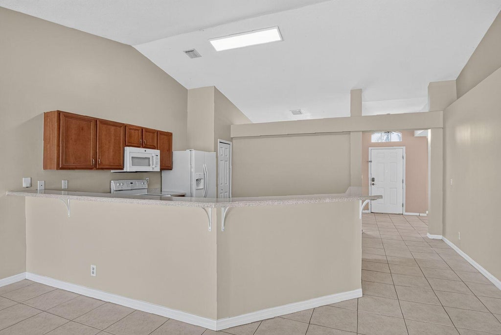 Photo of 522 SW Mccomb Avenue, Port Saint Lucie, FL 34953 (MLS # B26045741)
