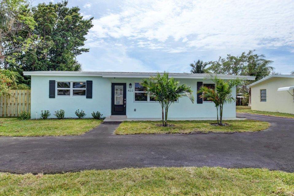 Paradise Awaits! Walking distance to the beach, The Old Key Lime House and other notable nearby restaurants. This Lantana Dream home has been completely remodeled. New Kitchen, Baths, Roof, Impact Windows, HVAC, Electrical, Plumbing, Insulation, Sheetrock, Doors/Trim, Flooring, Sprinkler System, Landscaping, Patio, Privacy Fence and Driveway. The master bedroom was redesigned and offers an en suite bath and large walk-in closet. The home has a bright new kitchen with self-closing cabinet doors/drawers, granite, SS appliances, and a built in pantry. It has a separate laundry room with new front load washer/dryer. Your private tropical oasis awaits with an amazing large back yard with a new patio, and landscaping, big enough to entertain all family and friends. NO HOA, Boat/RV Parking.