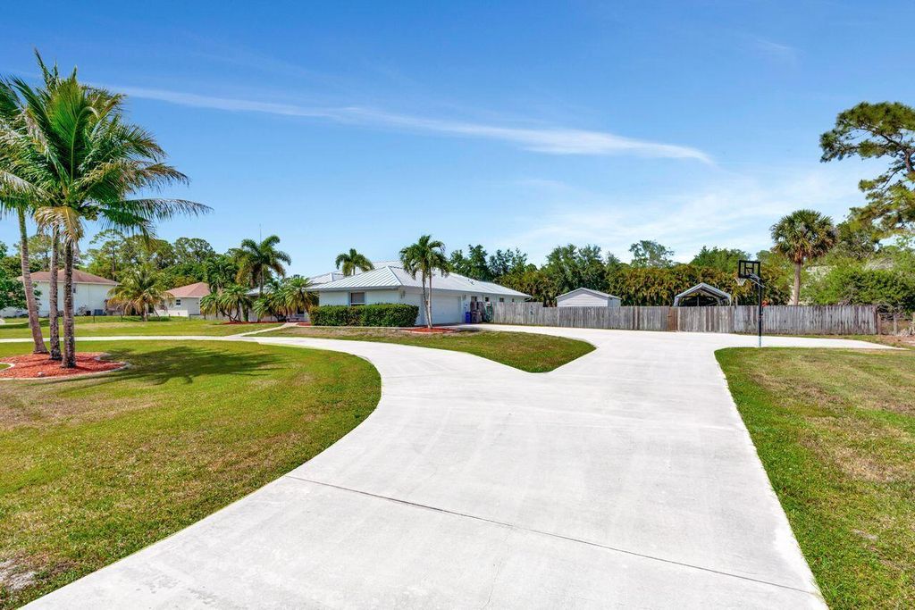 Photo of 13229 158th Street N, Jupiter, FL 33478 (MLS # R11081952)