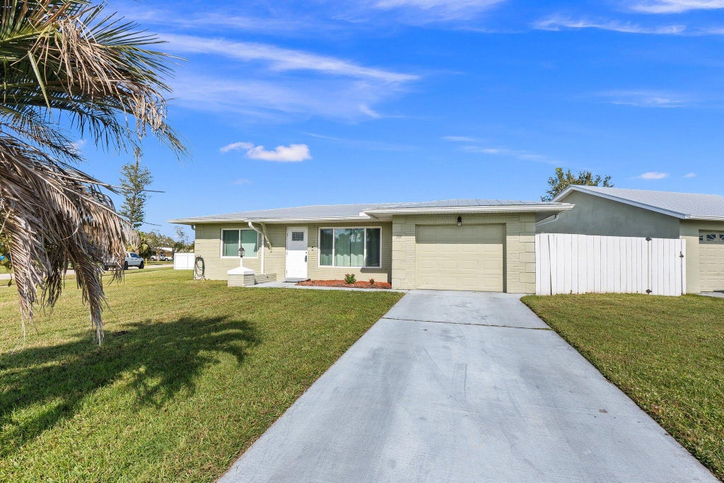 Photo of 285 SW Reynolds Avenue, Port Saint Lucie, FL 34983 (MLS # R11041905)