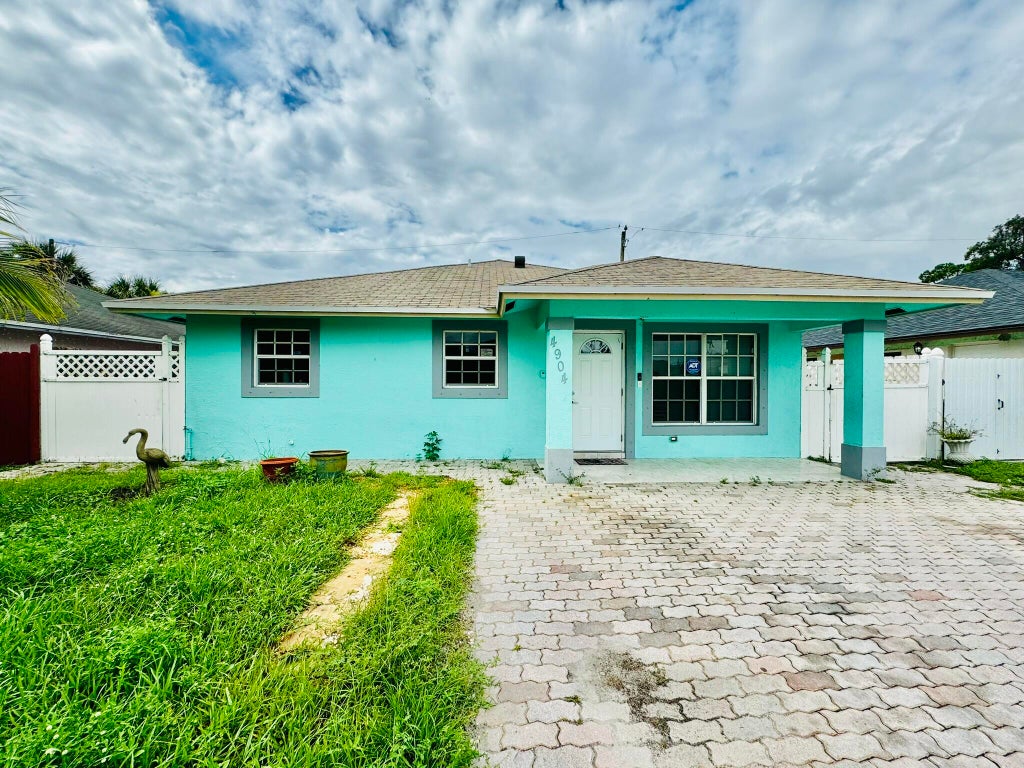 Photo of 4904 Dillon Street, Lake Worth, FL 33463 (MLS # R10996104)