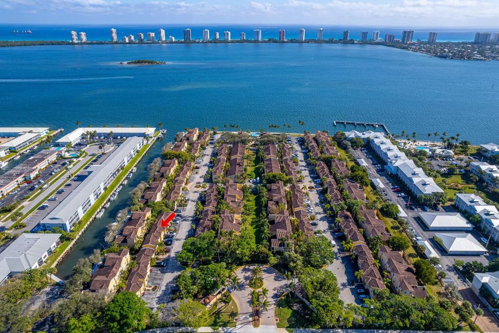 Photo of 1115 Lake Shore Drive #206, Lake Park, FL 33403 (MLS # R11050624)