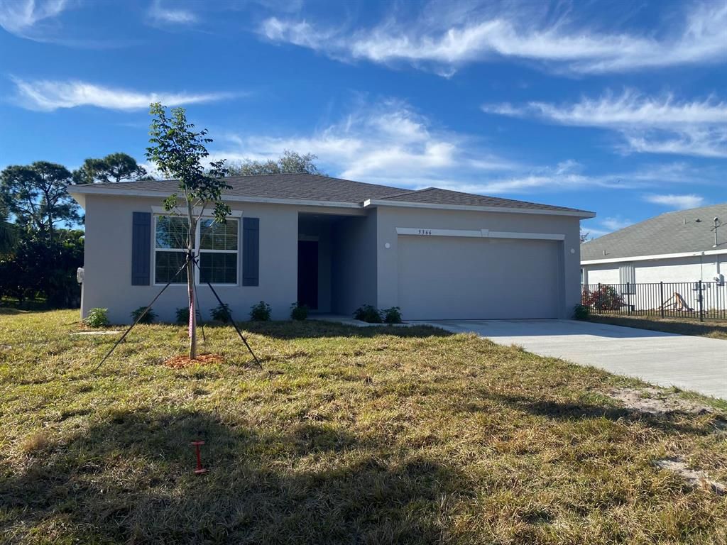 Photo of 3366 SW Escarole Street, Port Saint Lucie, FL 34953 (MLS # R10772350)