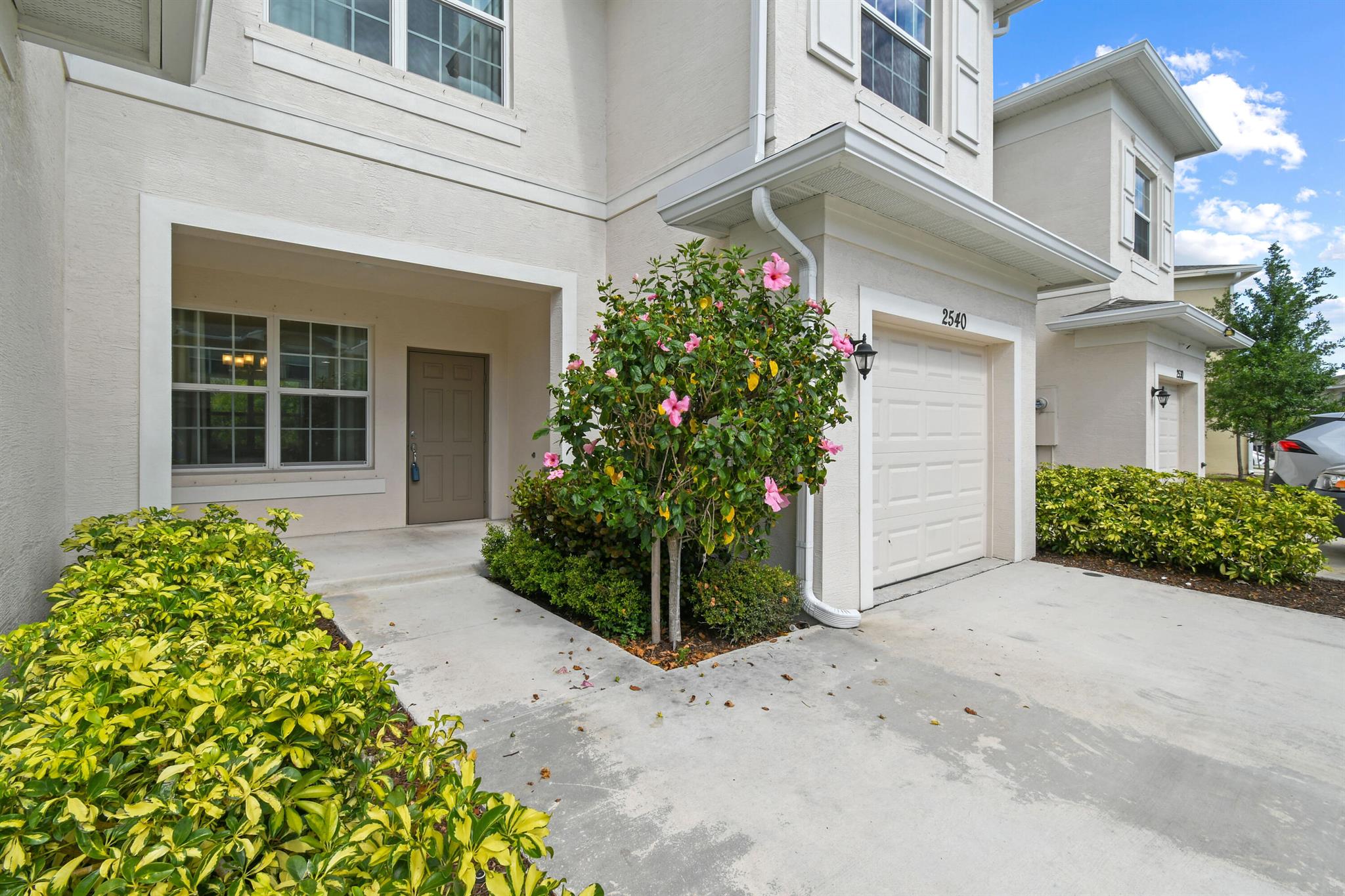 PRICE JUST REDUCED! Ultimately the very best value in Vizcaya Falls. Come see this well-maintained 3 bedroom, 2.5 bath, 1-car garage with 1,477 sf of living space. Main living area is ceramic tile, upper level has carpet. Kitchen has granite counters and SS appliances and a pantry. Convenient full size washer and dryer upstairs. Enjoy the nice back patio which overlooks a large green spalce for kids to play. Built in 2021, Vizcaya Falls amenites include tennis, basketball, pool, clubhouse, playground and gym. Investor friendly with leasing allowed right away with 6 month minimum.