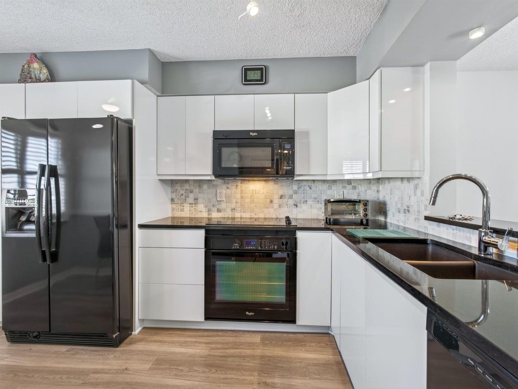 Photo of 7290 Kinghurst Drive 703, Delray Beach, FL 33446 (MLS # R11145862)