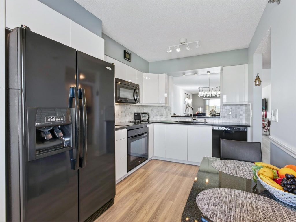 Photo of 7290 Kinghurst Drive 703, Delray Beach, FL 33446 (MLS # R11145862)