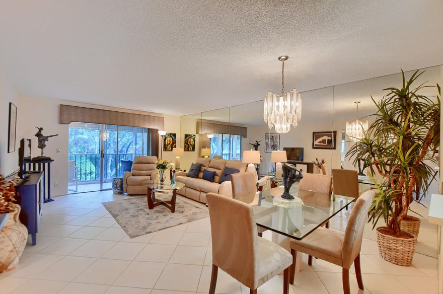 Live the sweet, Delray Beach life in this wonderful gated community with lush tropical landscaping. A close walk to the newly remodeled clubhouse will offer all kinds of activities to choose from, completion this late spring. Just 15 minutes from downtown Delray Atlantic Ave. and 20 minutes to the municipal beach. This corner unit condo has extra windows which give it a wonderful light and bright feel to the space. The condo has been well maintained and clean. Ready to move in and enjoy. Large and roomy primary suite. A large screened in porch with doors in back offers nice indoor/outdoor space with privacy. All furniture except artwork comes with the condo.