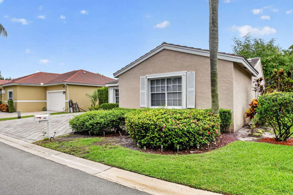 Photo of 208 CARIBE Court, Greenacres, FL 33413 (MLS # B26063674)