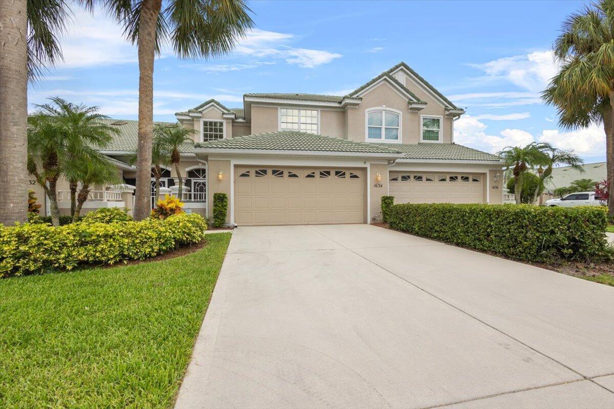 Beautiful Townhouse at Lake Charles in St Lucie West. Features CBS Construction, Barrel tile roof, 2 story, 3 Bedrooms, 2.5 Baths, Front screen enclosed porch & back lanai with screens & windows. Master Suite is on first floor & other 2 bedrooms & Bath is upstairs. Large Great Room, volume ceilings & fabulous Updated eat in kitchen include SS appliances, 2 pantries, granite counter tops, copper back splash, Island & breakfast Bar. Oversized 2 Car garage & Large Laundry Room with built in's.Updated Roof:2009, A/C: 2022, Water Heater: 2016. Panel Hurricane shutters. HOA fee's include building insurance, manned gated security, common areas, cable, Insurance-Bldg, lawn care, maintenance-exterior & roof, recreational facility & reserve Fund. Located in the heart of St Lucie West.
