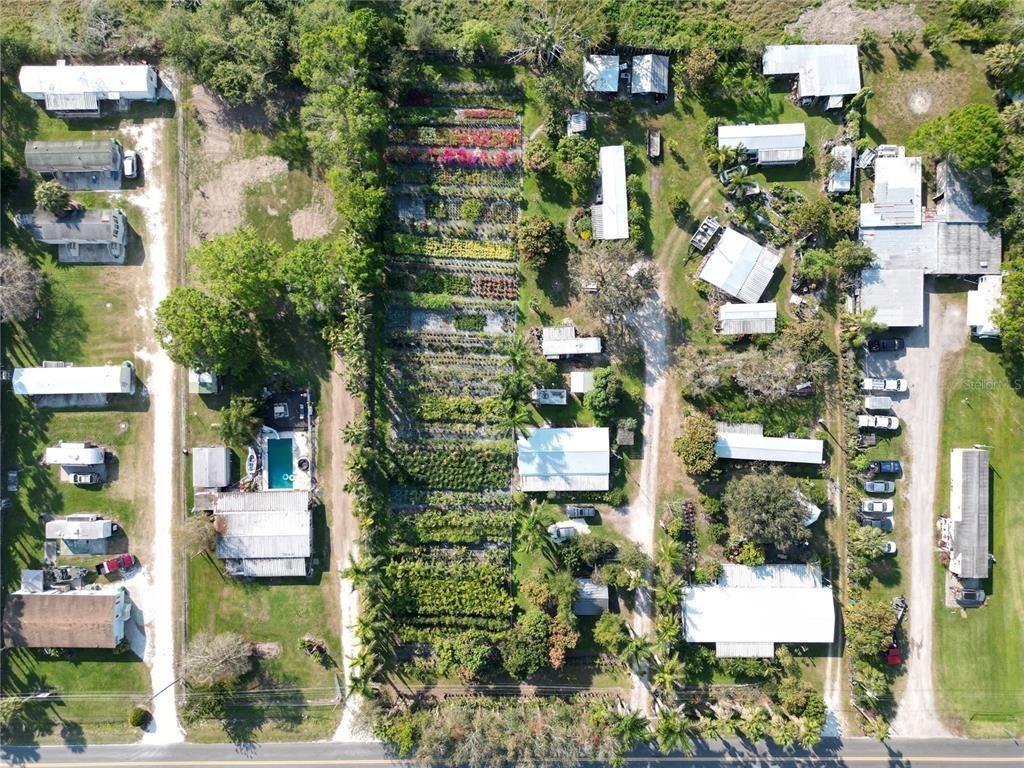 TWO FOR ONE! A Beautiful Nursery and 3 rental Income properties on site. 1.34 acres located 1 mile from Lake Okeechobee! one doublewide with screen room, one singlewide with porch, and an park model with porch. Metal roofs are approximately 4 years old, City water, 2 private septic's. Fenced, central ac/heat on 2 of the units, a window unit on the park model. Nursery has many mature fruit trees, a variety of mature palm trees, and various plants and shrubs. A must see! Run your business, and live on site, AND produce rental income! Or sell off nursery inventory and enjoy your rental income! Call today for a private showing. (an additional 5 unit mobile home park is for sale two parcels down, we can do a package sale if desired) SELLER FINANCING AVAILABLE! MOTIVATED SELLER.