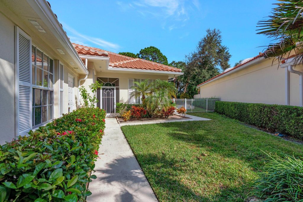 Photo of 150 Lost Bridge Drive, Palm Beach Gardens, FL 33410 (MLS # R11039191)