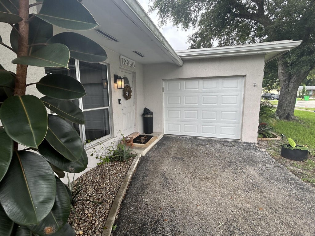 Photo of 12350 NW 29th Street, Sunrise, FL 33323 (MLS # B26036430)