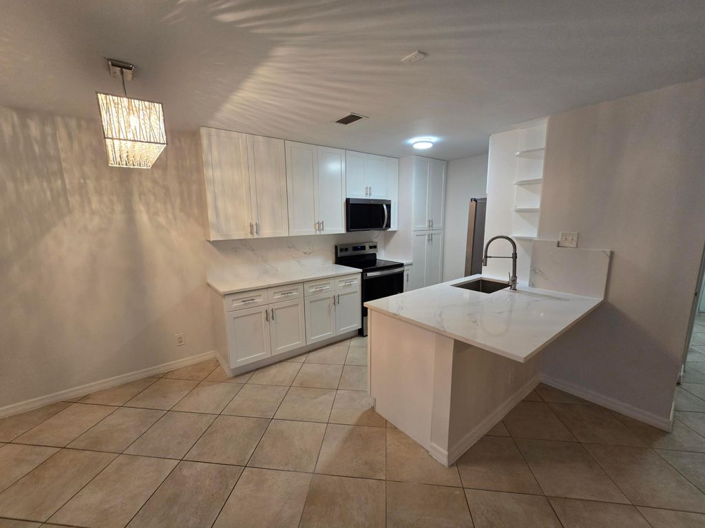 Photo of 4503 NW 6th Avenue, Deerfield Beach, FL 33064 (MLS # B26023747)