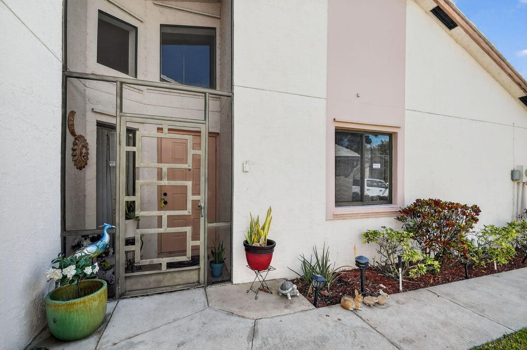 Photo of 6049 Strawberry Lakes Circle, Greenacres, FL 33463 (MLS # R11165845)