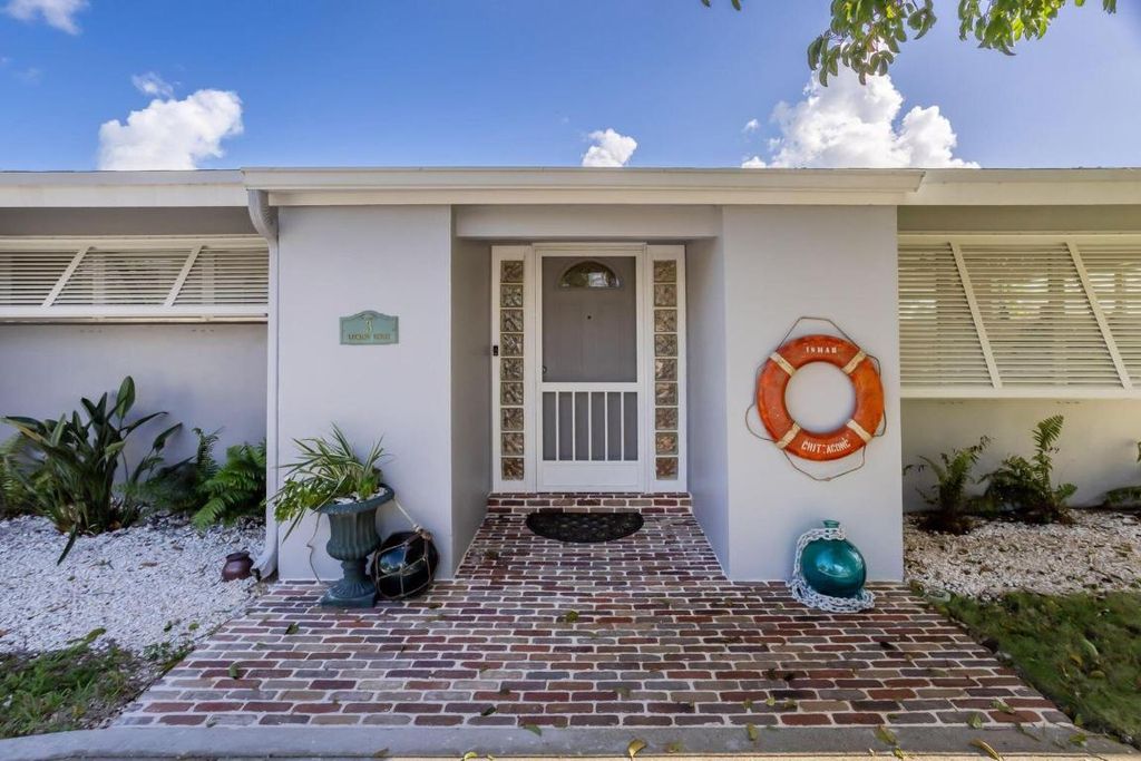 Photo of 3 Leeward Circle, Tequesta, FL 33469 (MLS # R10945571)