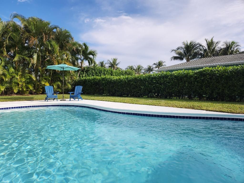 Photo of 3 Leeward Circle, Tequesta, FL 33469 (MLS # R10945571)