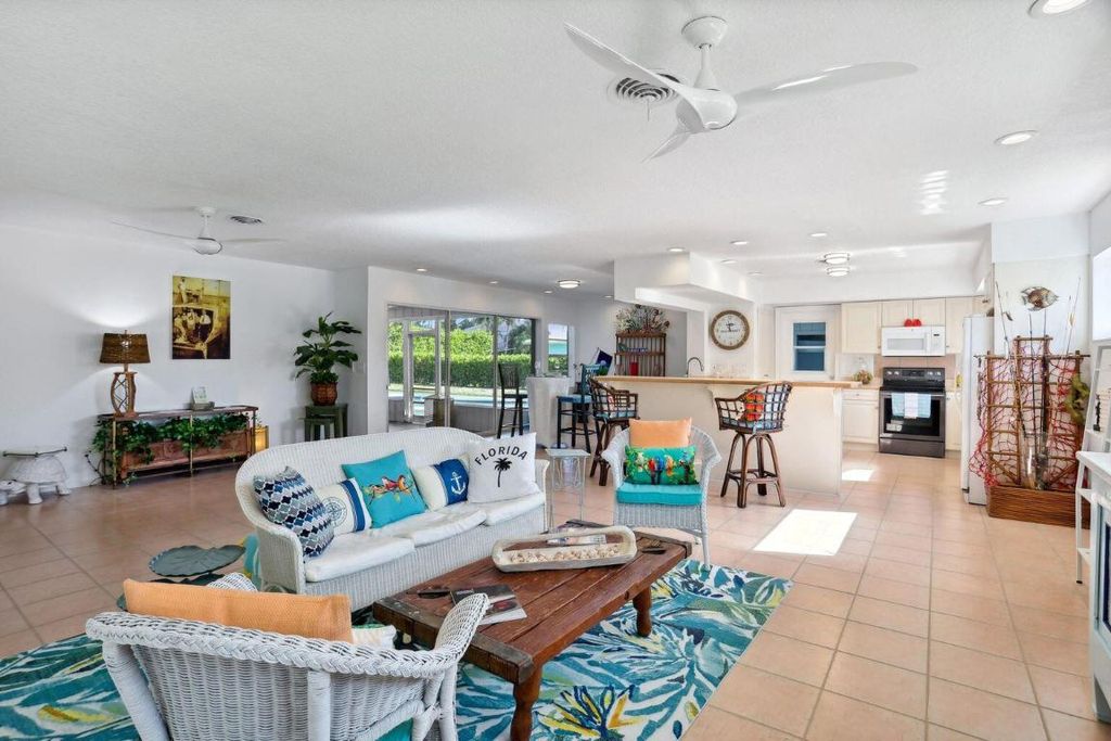 Photo of 3 Leeward Circle, Tequesta, FL 33469 (MLS # R10945571)