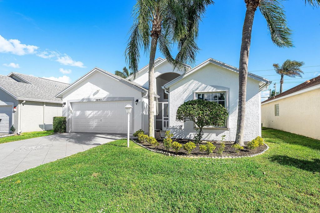 Photo of 5097 Robino Circle, West Palm Beach, FL 33417 (MLS # B26002184)