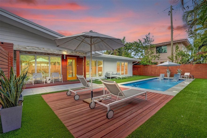 Contemporary Sanctuary: Moments from Private Beach - Discover the pinnacle of coastal living with 3-Bedrooms/2-Bathrooms + private office/den ranch home situated one block from private beach in the exclusive Hillsboro Shores enclave. Surrounded by multimillion-dollar estates, this home fuses Palm Springs modernism w/ the allure of South Florida's coastal charm. Newer saltwater pool w/ premium landscaping. Primary suite w/ a spa-like bathroom, large custom closet, sitting room w/ fireplace, high impact windows & doors, and 2-car garage. The open-plan living/dining areas flow effortlessly into a chefs kitchen. This property includes premium upgrades, metal roof, newer piping and electric, freshly painted & meticulously maintained. This home embodies modern luxury w/ resort-style living.