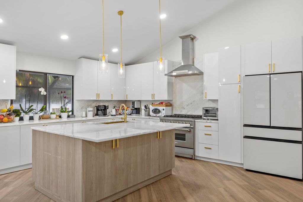 Photo of 845 NE Mulberry Drive, Boca Raton, FL 33487 (MLS # B26002125)