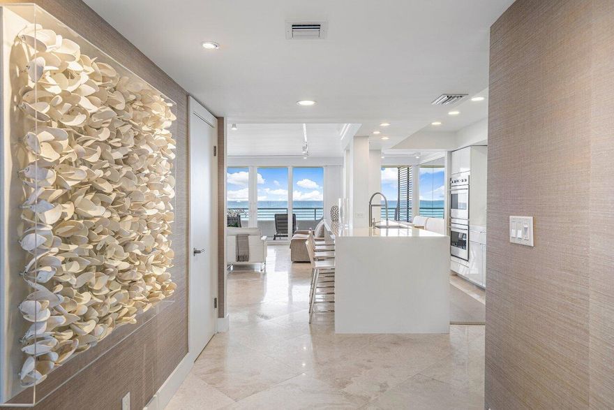 Much sought after 2 Bedroom + Den - 2.5 Bath Direct Oceanfront Corner Unit offers stunning views from every room. The open floor plan is beautifully updated with cream colored stone floors throughout the main living areas. There is a gorgeous all white open kitchen w/Subzero that flows into the dining, living and den/media rooms. All with spectacular Ocean views. Full hurricane impact Glass with white interior frames. Each room accesses the 3-sided wrap around balcony. The 2600 building is one of South Ocean Boulevards most prestigious addresses as well as being an architectural masterpiece. This Gated Community is Pet Friendly and hosts a new fitness center, har-tru tennis courts, a newly renovated pool area and one of the widest beaches. SEE SUPPLEMENT