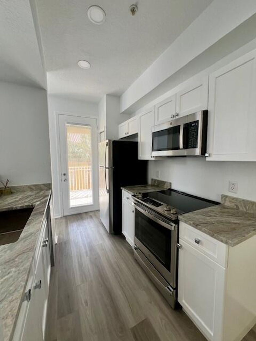 Photo of 11019 Legacy Lane #303, Palm Beach Gardens, FL 33410 (MLS # R10964930)