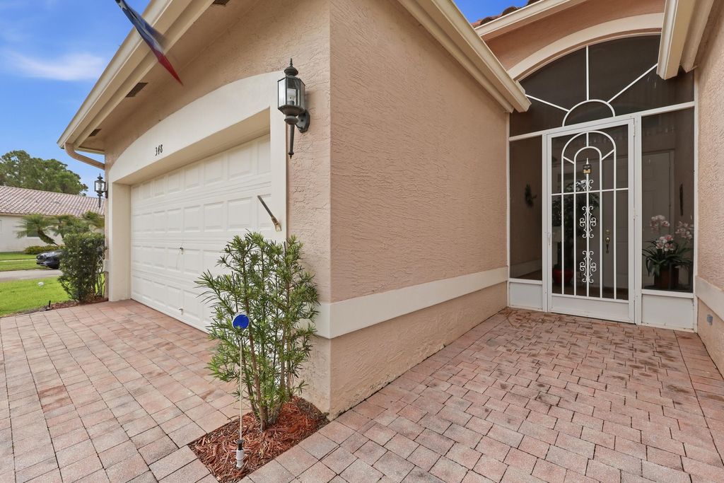 Photo of 348 NW Toscane Trail, Port Saint Lucie, FL 34986 (MLS # B26009136)