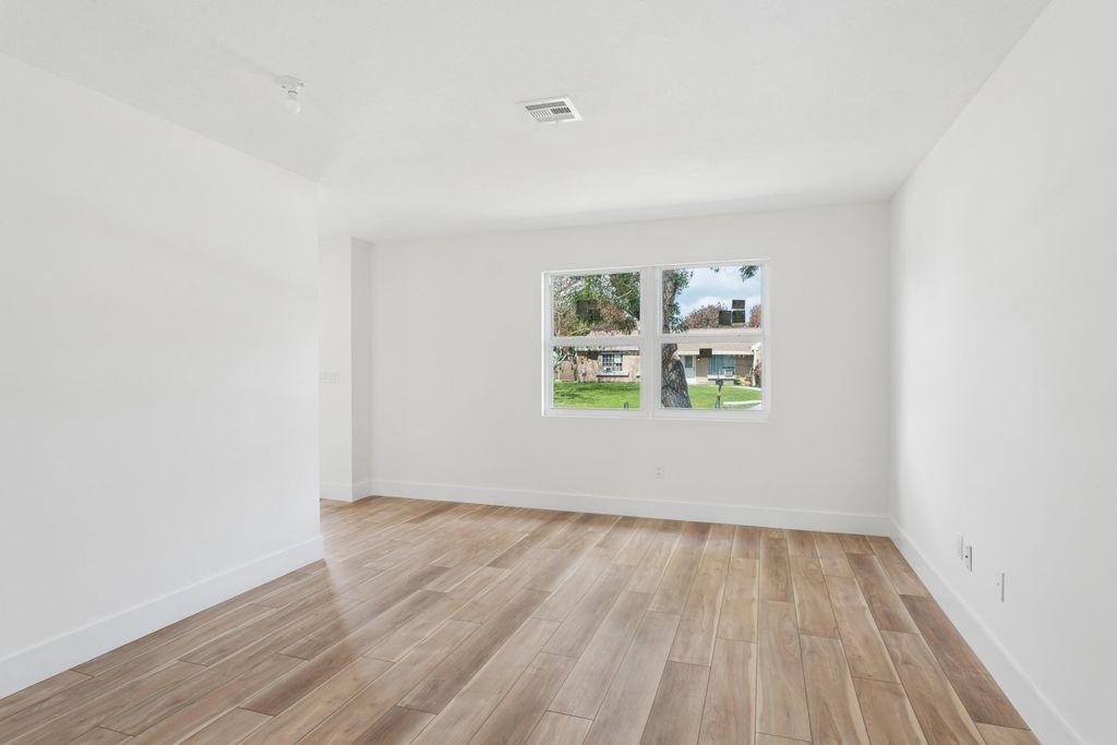 Photo of 1911 SE Carvalho Street, Port Saint Lucie, FL 34983 (MLS # B26019892)