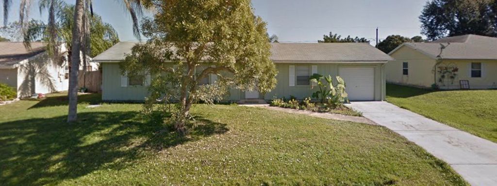 Photo of 1911 SE Carvalho Street, Port Saint Lucie, FL 34983 (MLS # B26019892)
