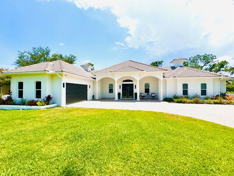 Photo of 10520 SW Fiddlers Way, Palm City, FL 34990 (MLS # R11093082)