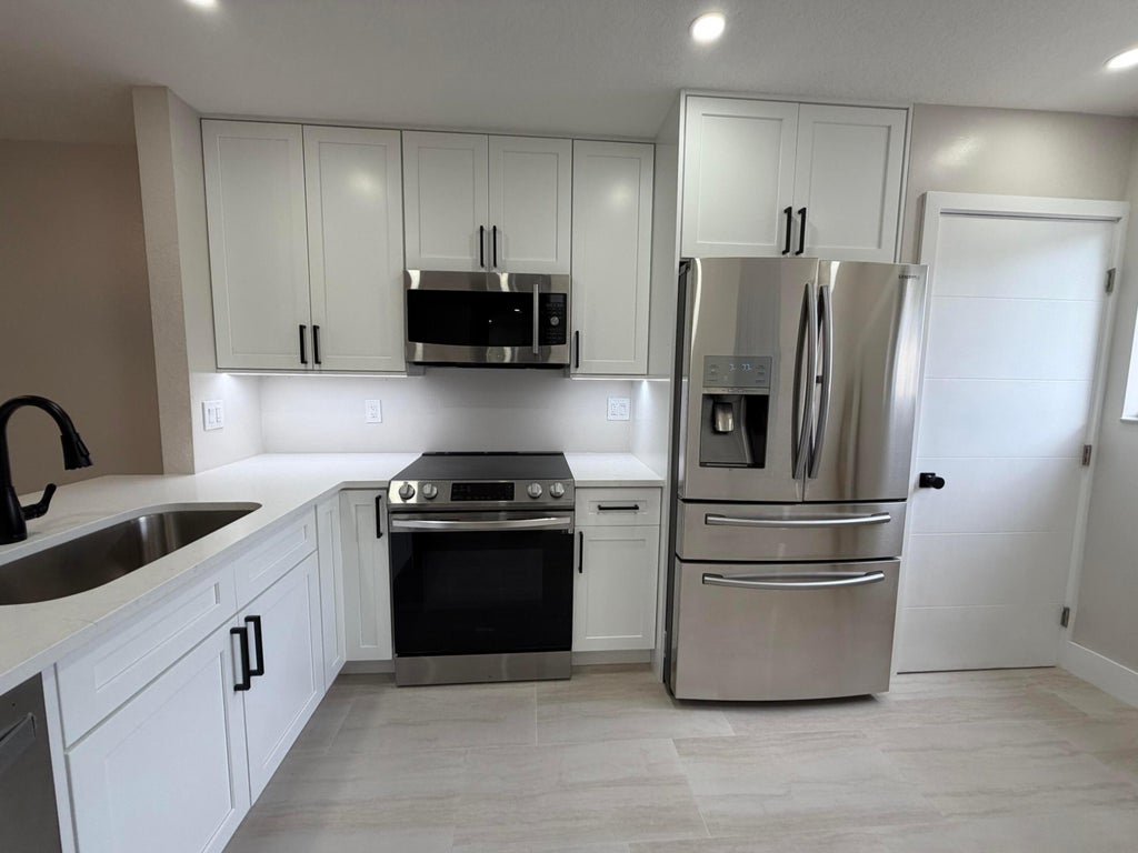 Photo of 6631 Winfield Boulevard #2-6, Margate, FL 33063 (MLS # B26057669)