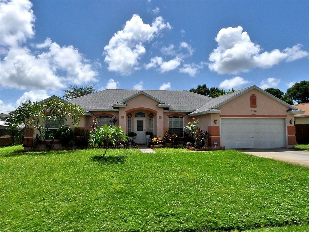 Photo of 2256 SE Carnation Road, Port Saint Lucie, FL 34952 (MLS # R10709113)