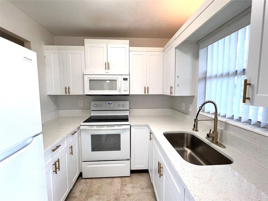 Beautiful remodeled 1-bedroom, 1-bath rental in desirable Deerfield Beach! This first-floor unit features brand
new kitchen with quartz countertop, stunning hardwood floors, freshly painted neutral walls, newer AC, water
heater, and appliances, along with ceiling fans and a modernized bathroom. Hurricane shutters are installed for
convenience. W/D Inside unit. Enjoy assigned parking right in front of the door and quick access to the community pool. Fantastic location near expressways, shopping, and beaches, just one mile from US-1. Move-in ready!