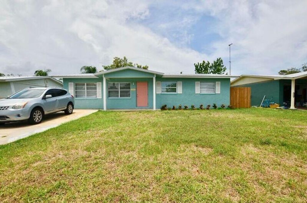 Photo of 3103 SE Orange Tree Place, Stuart, FL 34997 (MLS # R10958857)