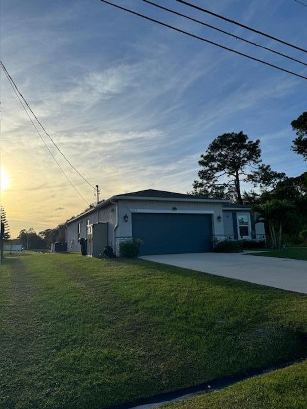 Photo of 4142 SW Ragen Street, Port Saint Lucie, FL 34953 (MLS # R10958121)