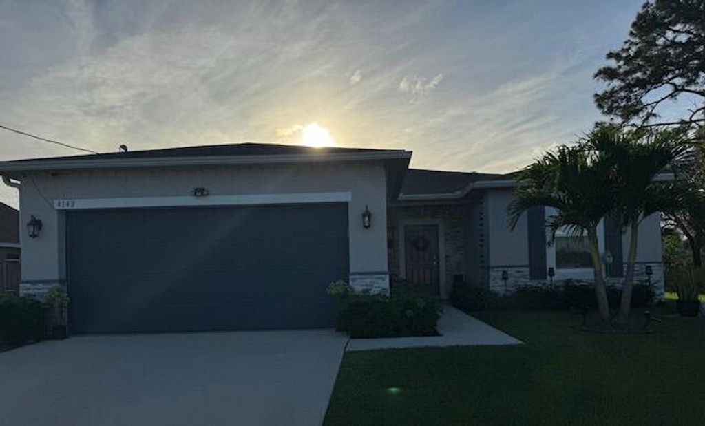 Photo of 4142 SW Ragen Street, Port Saint Lucie, FL 34953 (MLS # R10958121)
