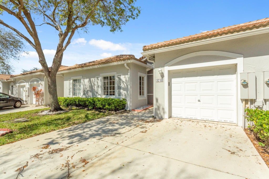 Photo of 4743 SW 13th Street, Deerfield Beach, FL 33442 (MLS # F10442860)