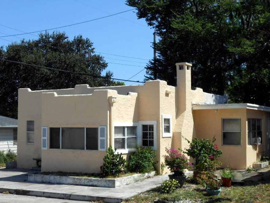 Nestled between L St. and M St., a short, direct, stroll into the heart of Lake Worth's delightful downtown.  Nearby too is Bryant Park, directly on the Intracoastal!  There you'll find boat ramps, a fishing pier, BBQ pits, and covered pavilions.  The best annual festivals are held at Bryant Park!  A mile further... THE BEACH!  Not only is the location of this spacious 3 bedroom / 2 bath house coveted, but its architecture is too... Gorgeous, original Spanish Mission design.  A coquina fireplace is the interior's centerpiece, while the carport outside is a feature your automobiles will appreciate.  An affordable-priced home, with a phenomenally fantastic lifestyle.  Enjoy this as your own residence, or keep it rented to tenants who will pay you high rent for the happiness they experience.