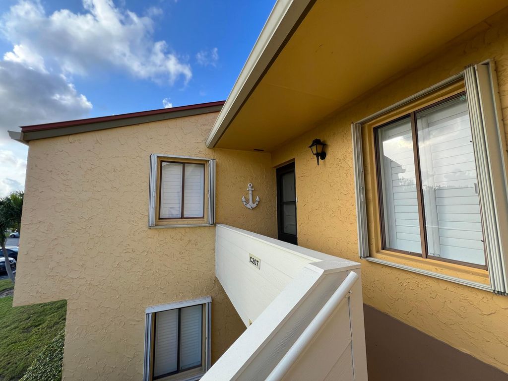 Photo of 5373 SE Miles Grant Road #C 207, Stuart, FL 34997 (MLS # R10990541)