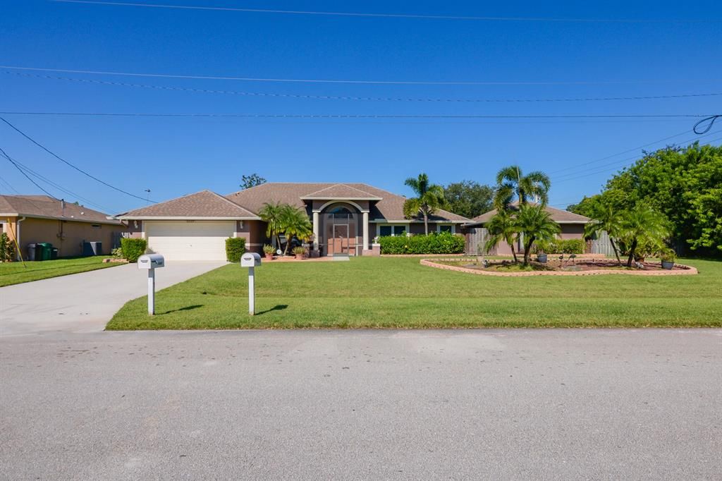 Photo of 5869 NW Zenith Drive, Port Saint Lucie, FL 34986 (MLS # R10748691)