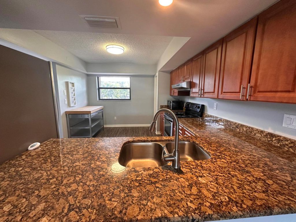 Photo of 1851 SW Palm City Road #E302, Stuart, FL 34994 (MLS # R11099431)