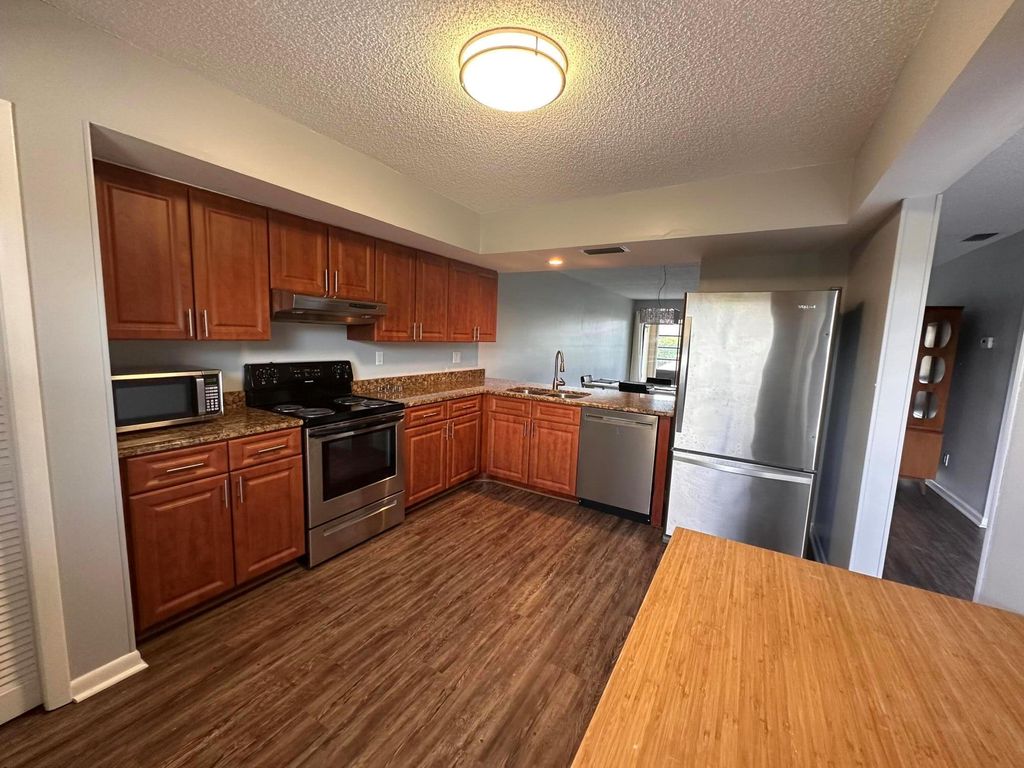 Photo of 1851 SW Palm City Road #E302, Stuart, FL 34994 (MLS # R11099431)