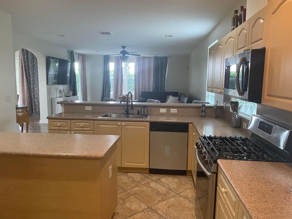 Photo of 10690 Old Hammock Way, Wellington, FL 33414 (MLS # B26007913)