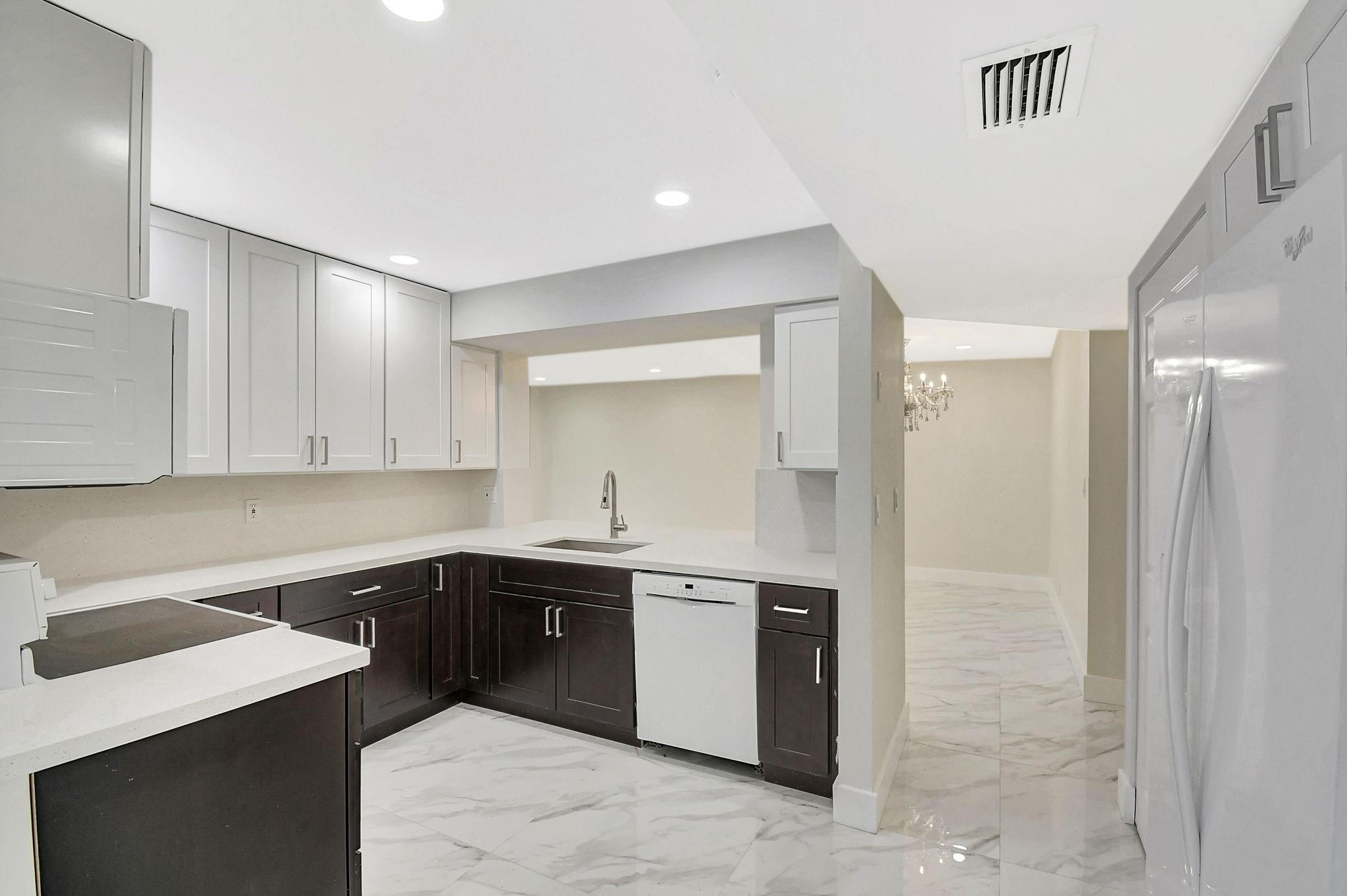 Beautifully remodeled 3-bed, 2-bath corner unit in Pine Island Ridge. This bright, private condo features porcelain tile throughout, golf course views, fresh paint, and a modern kitchen with quartz counters, wood cabinetry, stainless steel appliances, and breakfast area. Washer/dryer in unit. Building has elevator. Rent includes fiber internet, water, and cable TV. Enjoy access to an 18-hole golf course, 3 pools, gym, sauna, clubhouse, restaurants, sports bar, pickleball, playground, walking trails, and more. Close to highways, NSU, Broward College, shopping, and top-rated schools. One pet under 20 lbs allowed. Association approval required (2–4 weeks).
