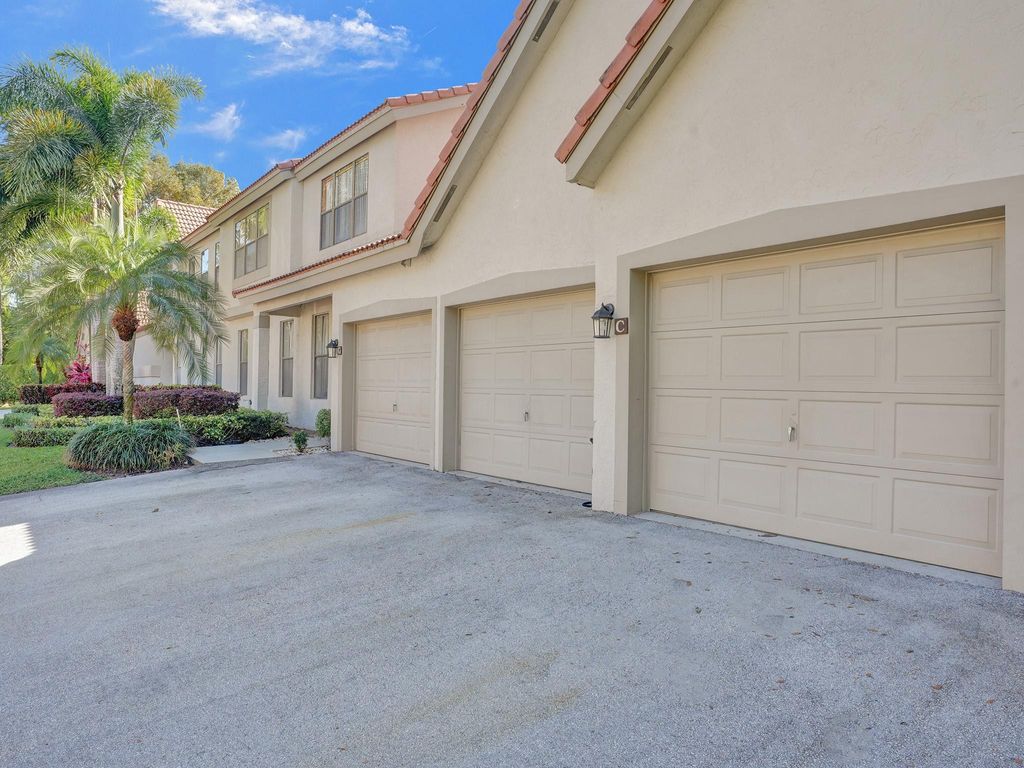 Photo of 5790 Coach House Circle #C, Boca Raton, FL 33486 (MLS # F10433246)