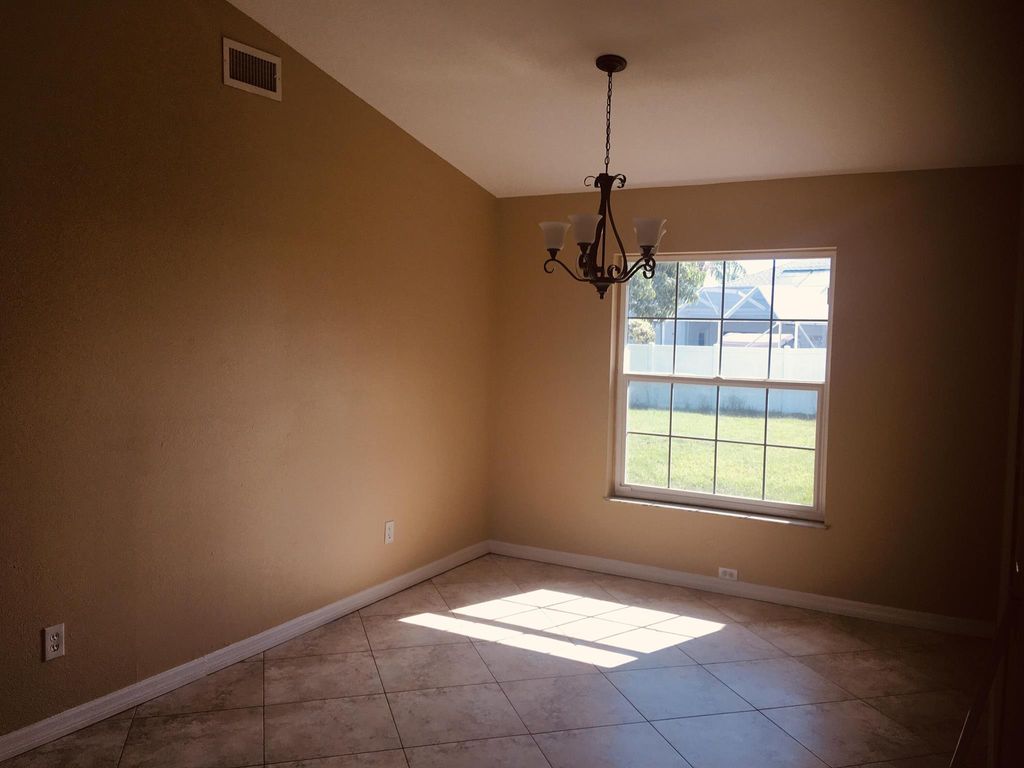 Photo of 3107 SE Card Terrace, Port Saint Lucie, FL 34984 (MLS # R11071100)