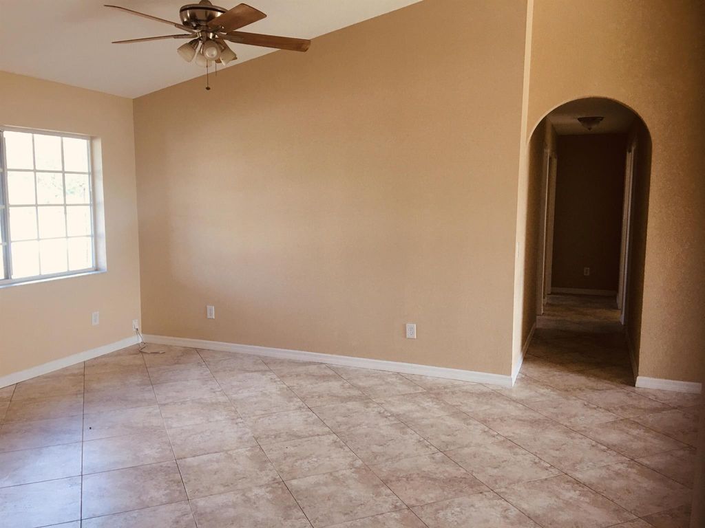 Photo of 3107 SE Card Terrace, Port Saint Lucie, FL 34984 (MLS # R11071100)